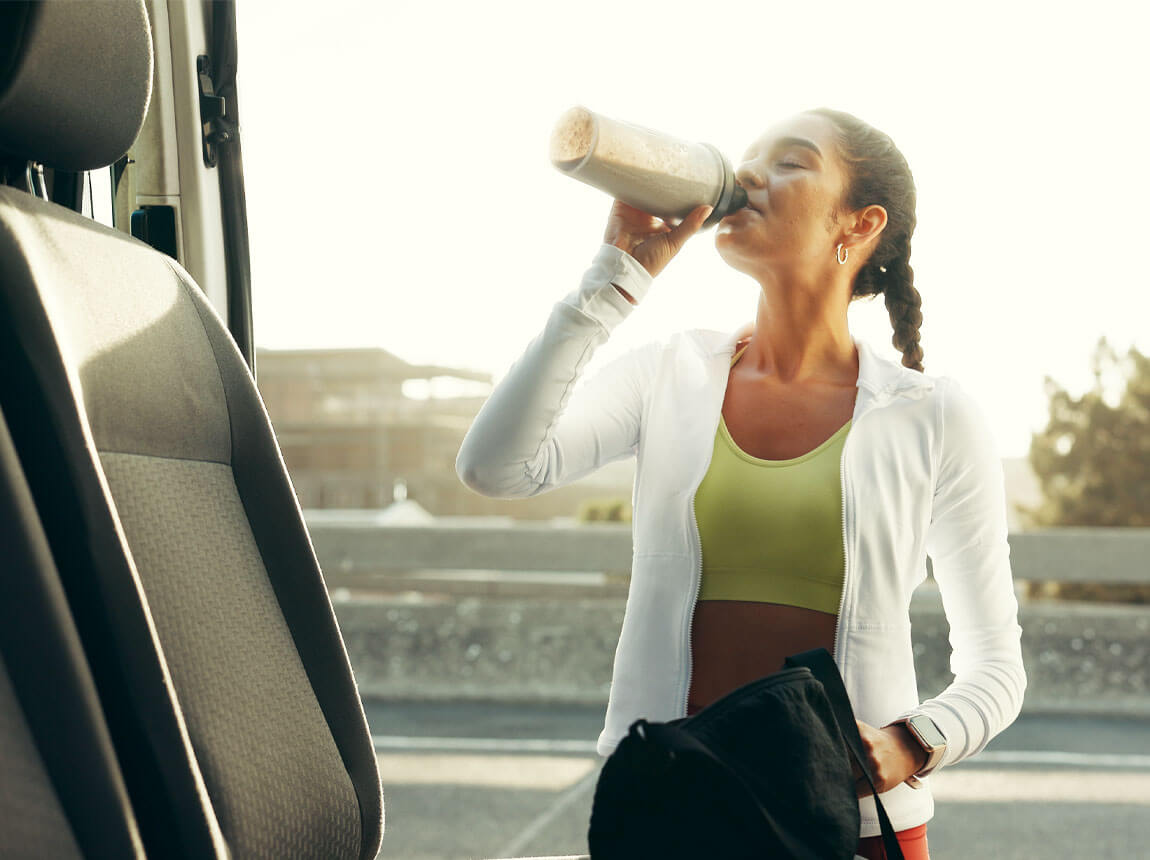 woman with a protein shake