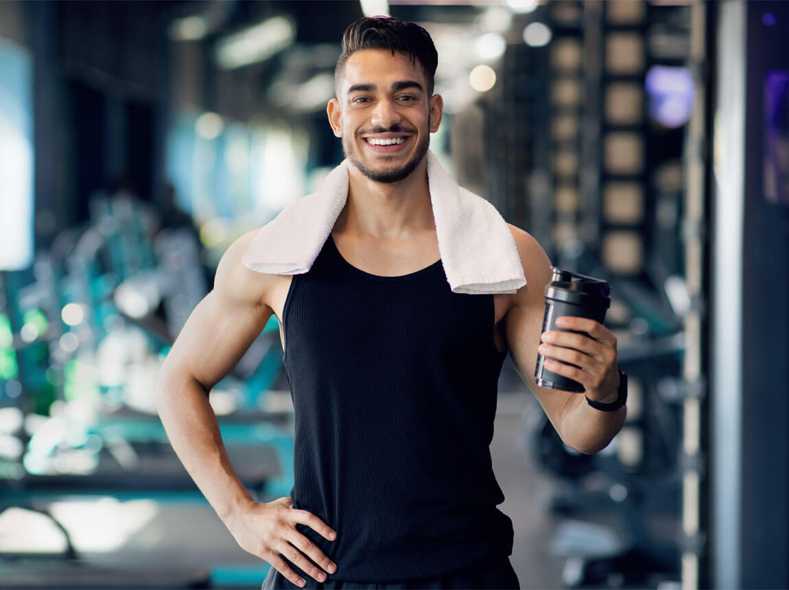 a man with creatine at the gym