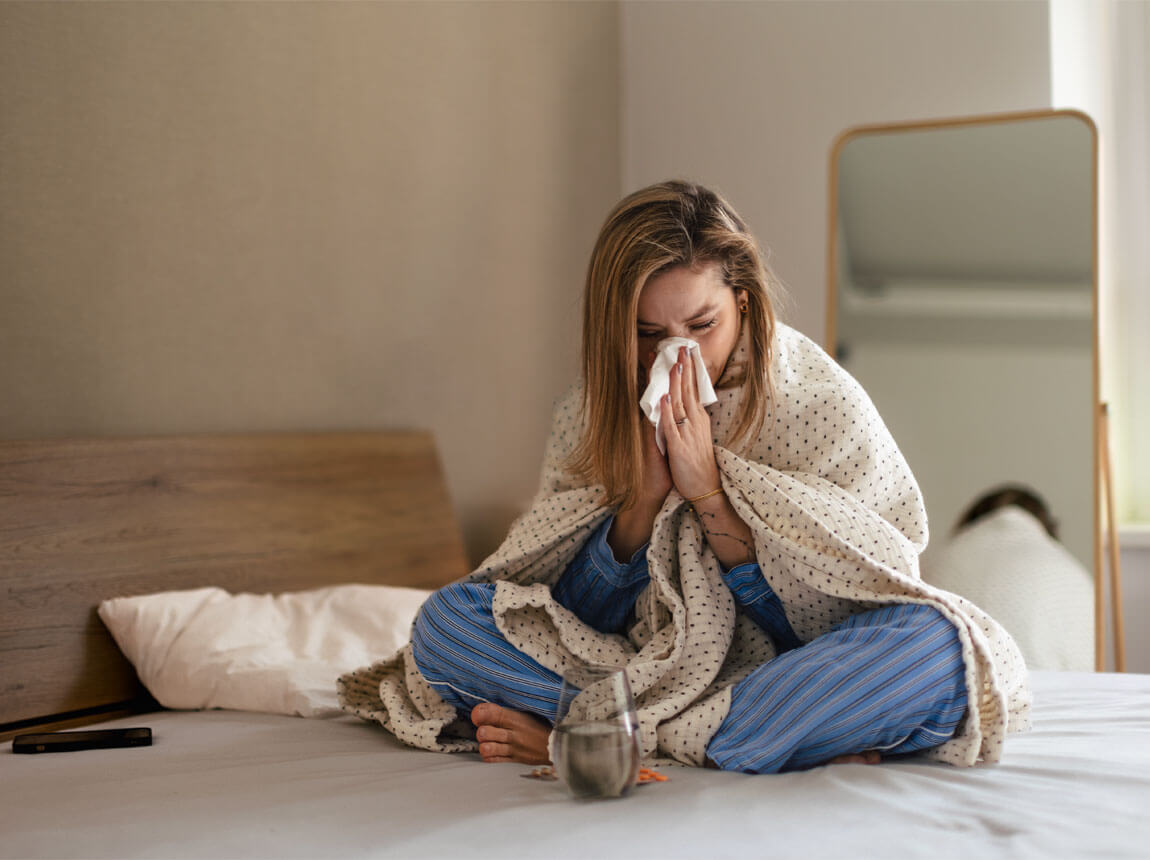 resistance - a woman with a cold in bed