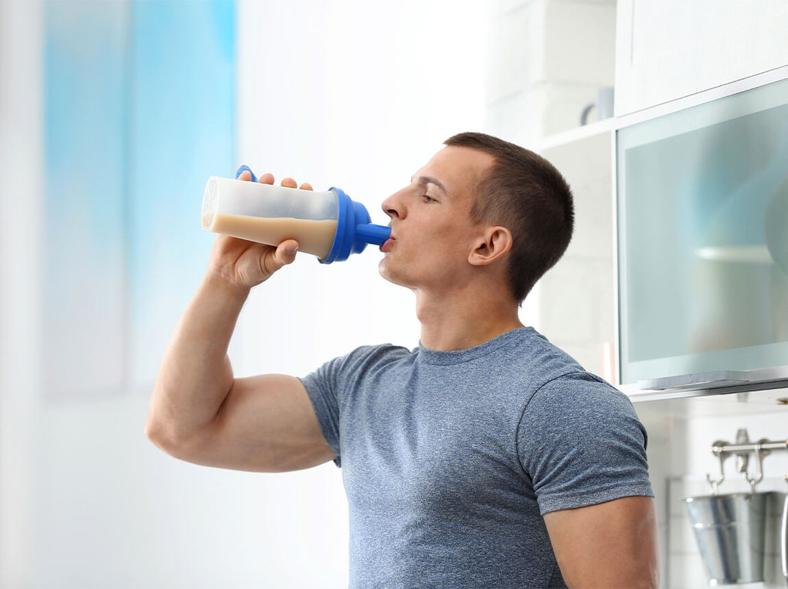 man with protein supplement