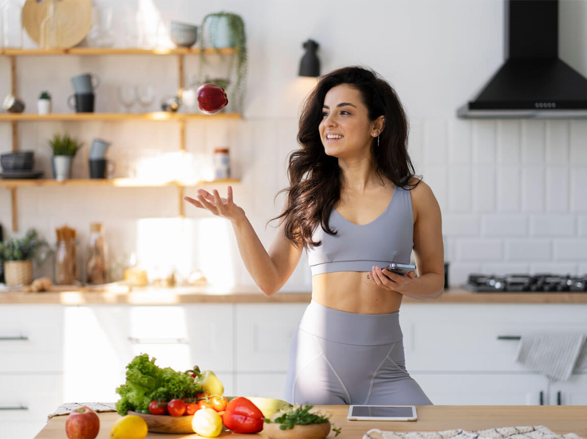 woman with an apple - vitamins