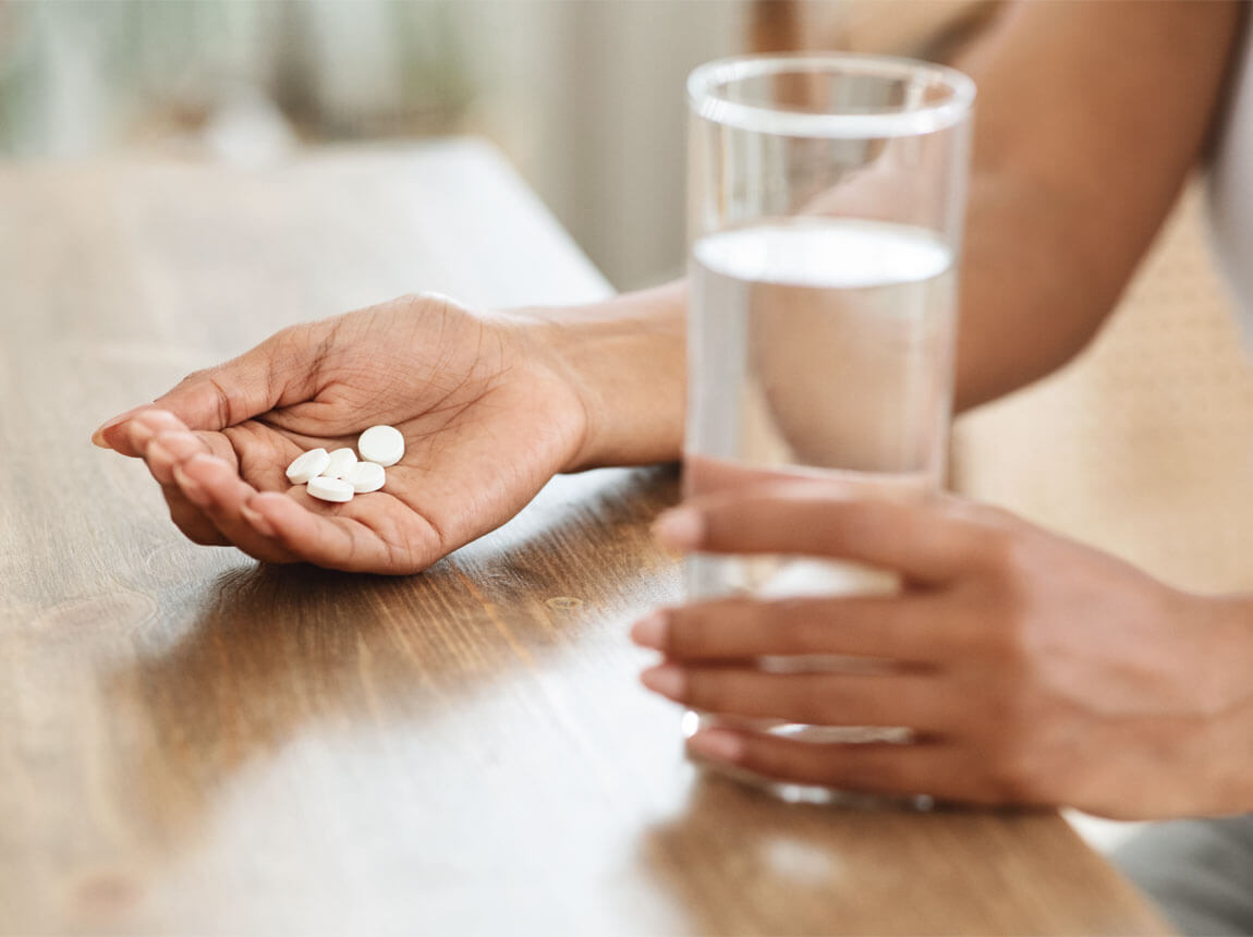 magnesium - woman with tablet